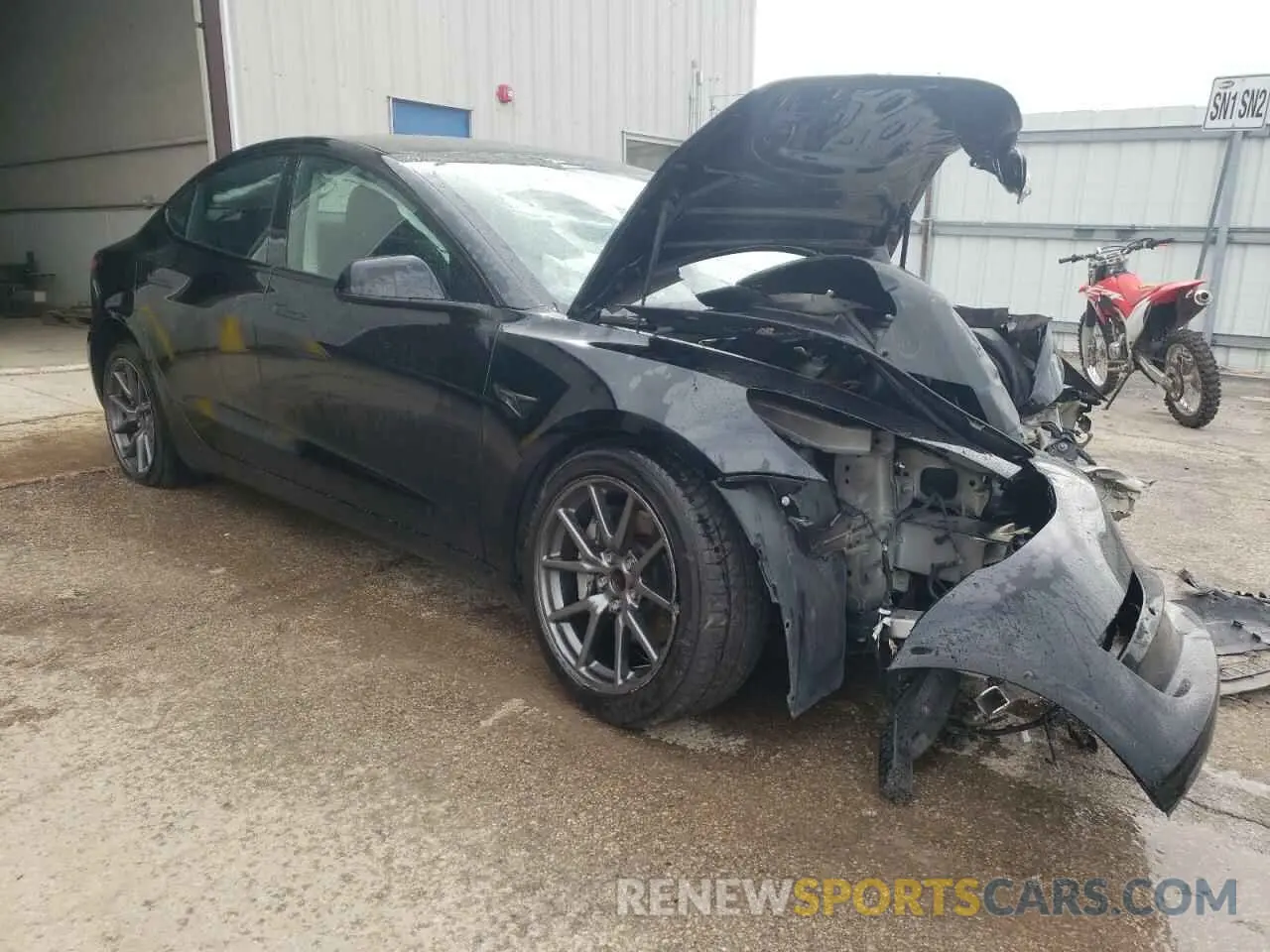 4 Photograph of a damaged car 5YJ3E1EA9NF371172 TESLA MODEL 3 2022
