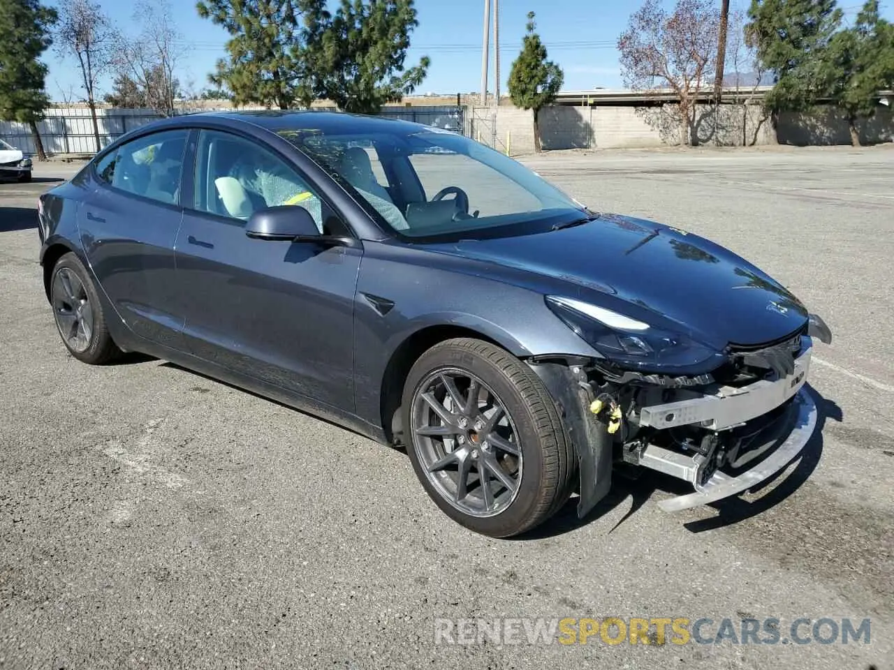 4 Photograph of a damaged car 5YJ3E1EA9NF373276 TESLA MODEL 3 2022