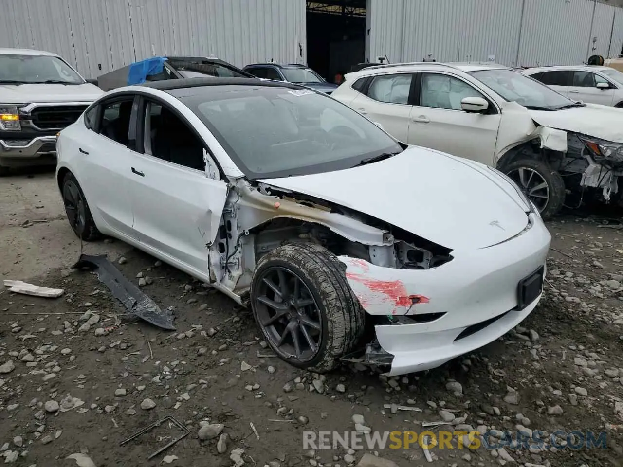 4 Photograph of a damaged car 5YJ3E1EAXNF114036 TESLA MODEL 3 2022