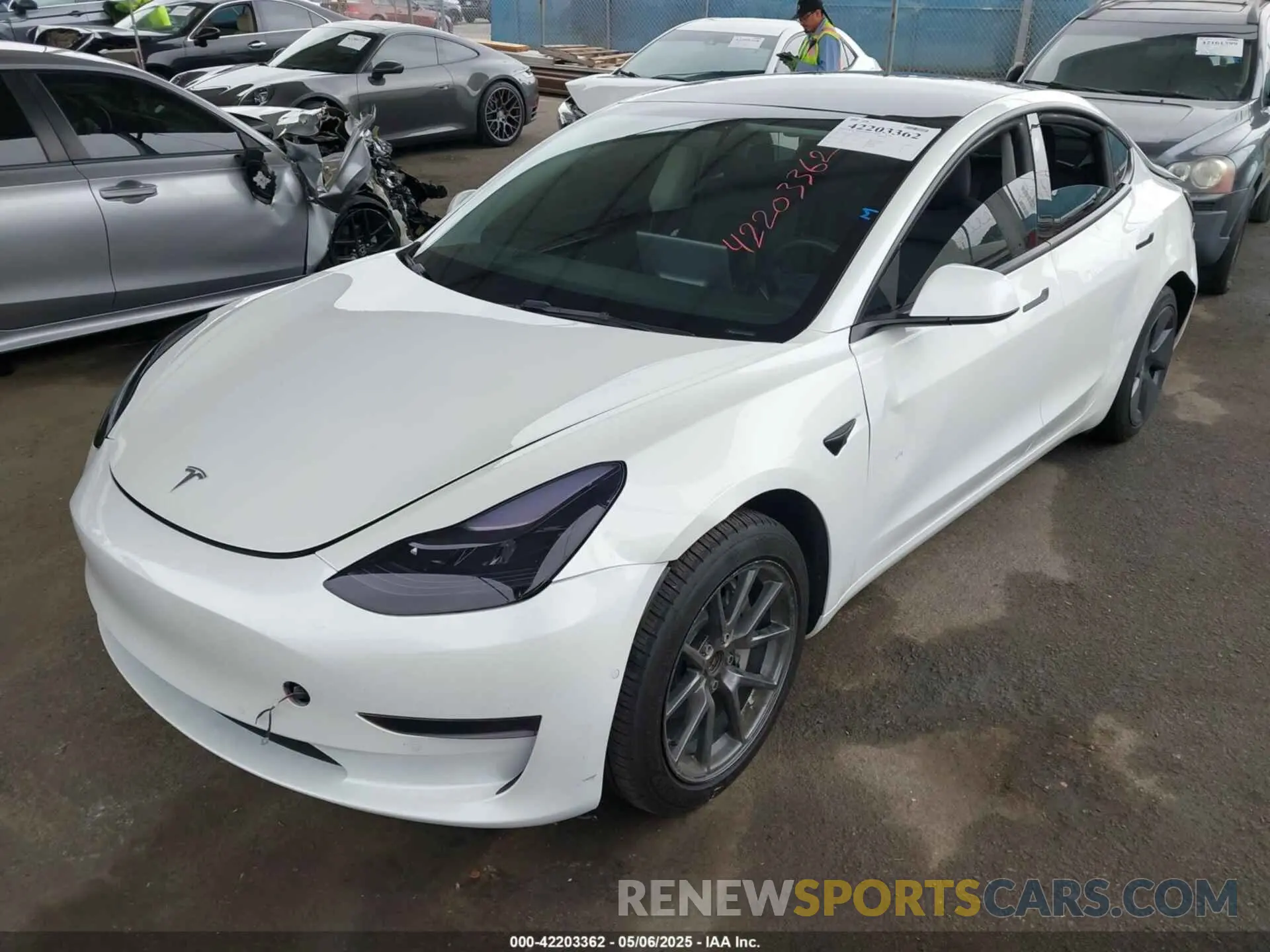 2 Photograph of a damaged car 5YJ3E1EAXNF117101 TESLA MODEL 3 2022