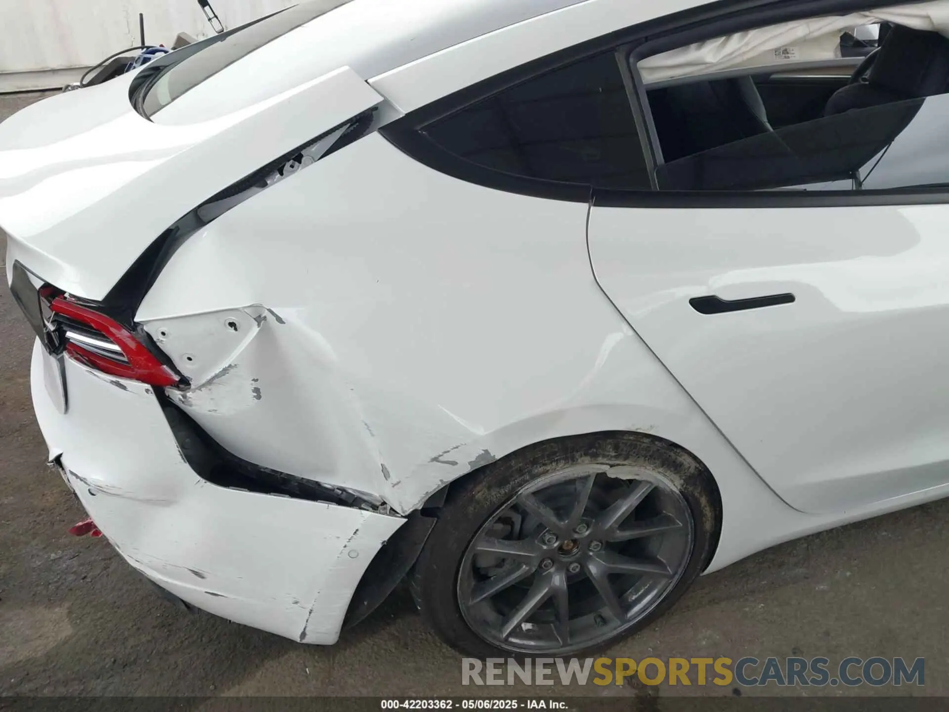22 Photograph of a damaged car 5YJ3E1EAXNF117101 TESLA MODEL 3 2022