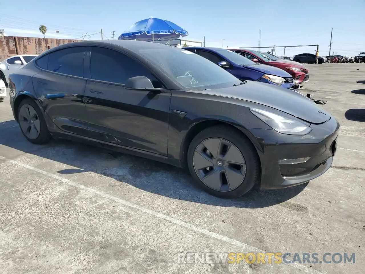 4 Photograph of a damaged car 5YJ3E1EAXNF120970 TESLA MODEL 3 2022
