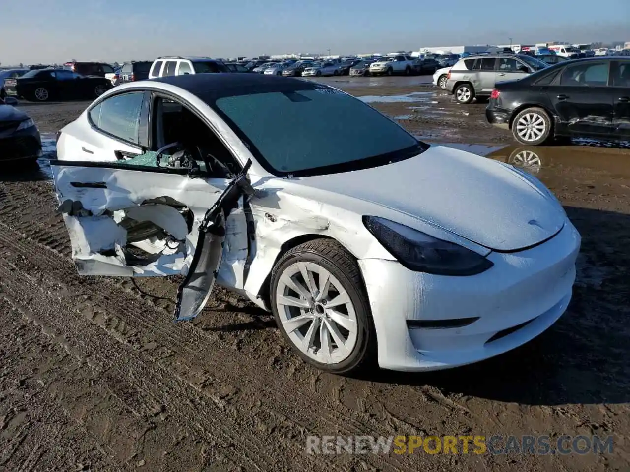 4 Photograph of a damaged car 5YJ3E1EAXNF145125 TESLA MODEL 3 2022