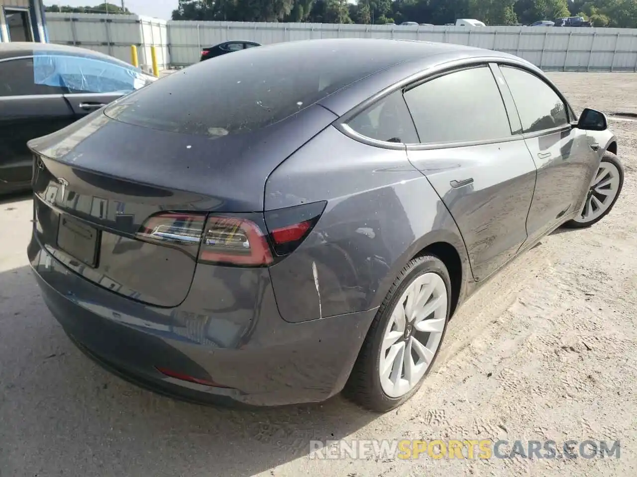 4 Photograph of a damaged car 5YJ3E1EAXNF155301 TESLA MODEL 3 2022