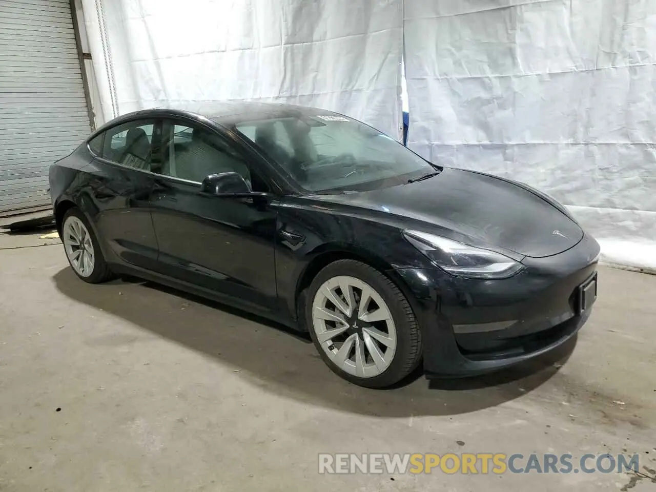 4 Photograph of a damaged car 5YJ3E1EAXNF184877 TESLA MODEL 3 2022