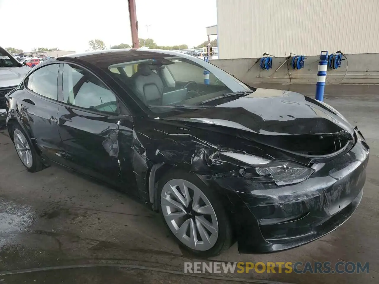 4 Photograph of a damaged car 5YJ3E1EAXNF186757 TESLA MODEL 3 2022