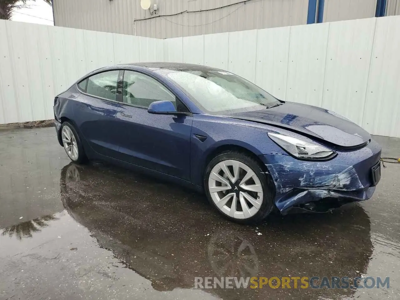 4 Photograph of a damaged car 5YJ3E1EAXNF190873 TESLA MODEL 3 2022