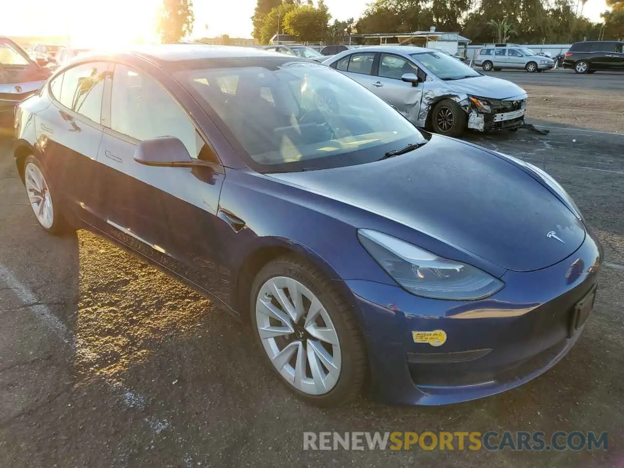 4 Photograph of a damaged car 5YJ3E1EAXNF209423 TESLA MODEL 3 2022