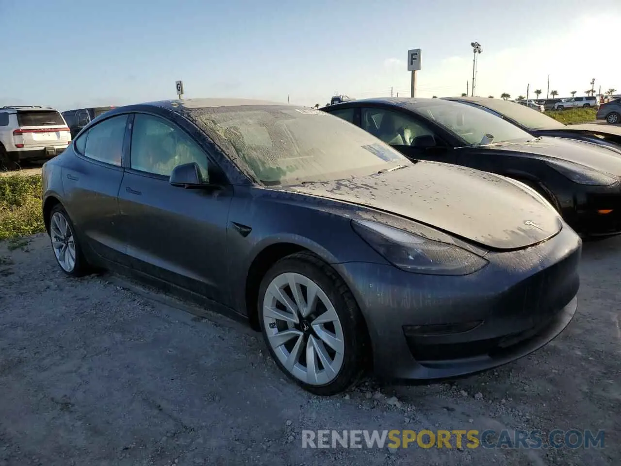 4 Photograph of a damaged car 5YJ3E1EAXNF286406 TESLA MODEL 3 2022
