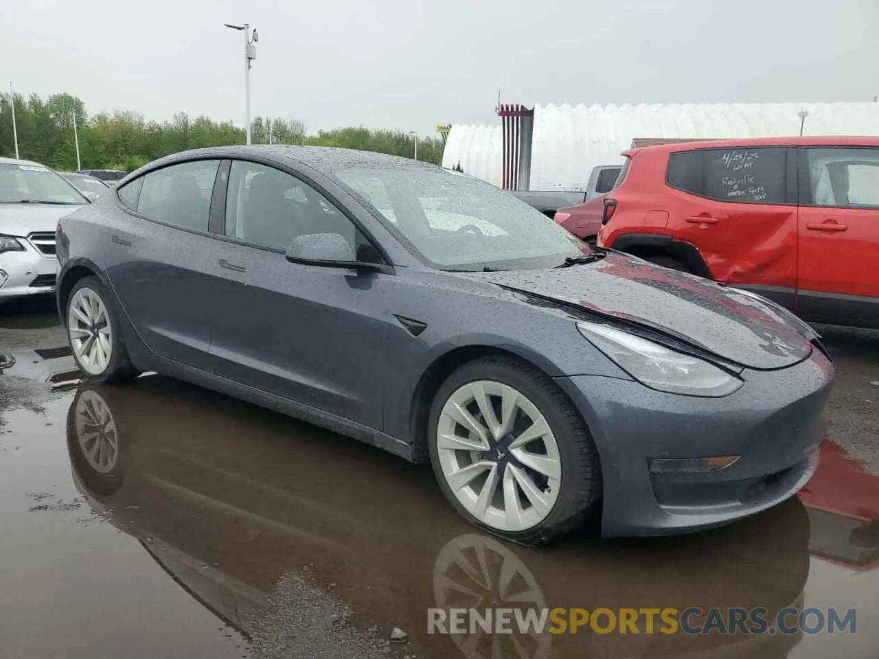 4 Photograph of a damaged car 5YJ3E1EAXNF289919 TESLA MODEL 3 2022