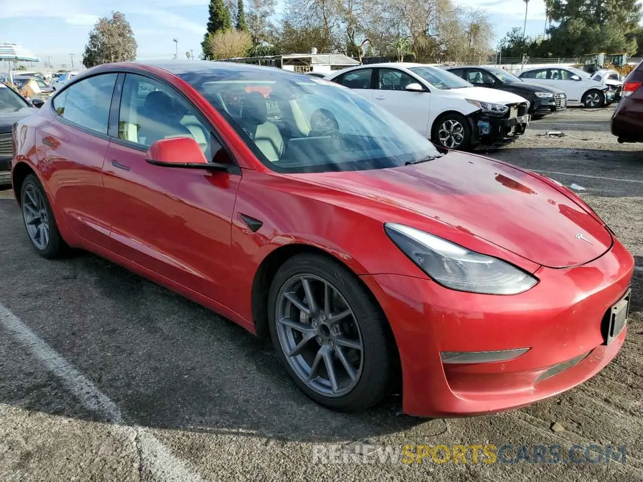 4 Photograph of a damaged car 5YJ3E1EAXNF290519 TESLA MODEL 3 2022