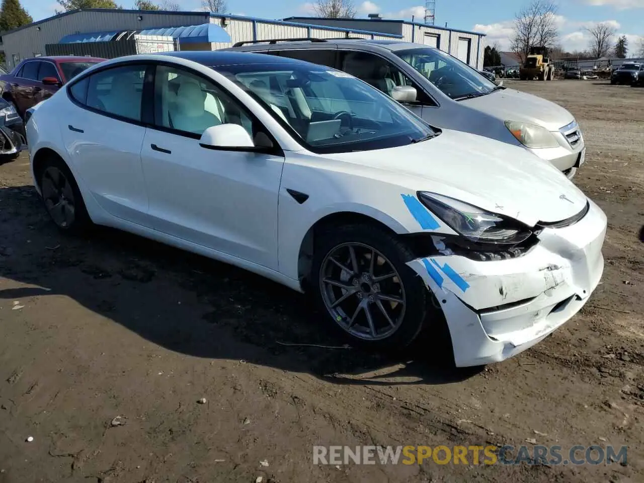 4 Photograph of a damaged car 5YJ3E1EAXNF303639 TESLA MODEL 3 2022