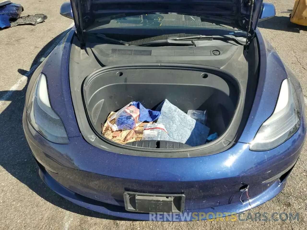 11 Photograph of a damaged car 5YJ3E1EAXNF304502 TESLA MODEL 3 2022