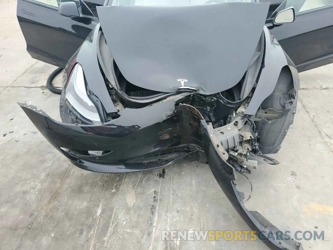 13 Photograph of a damaged car 5YJ3E1EAXNF310994 TESLA MODEL 3 2022