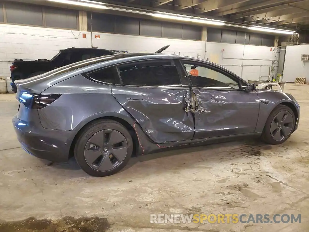 3 Photograph of a damaged car 5YJ3E1EAXNF313989 TESLA MODEL 3 2022