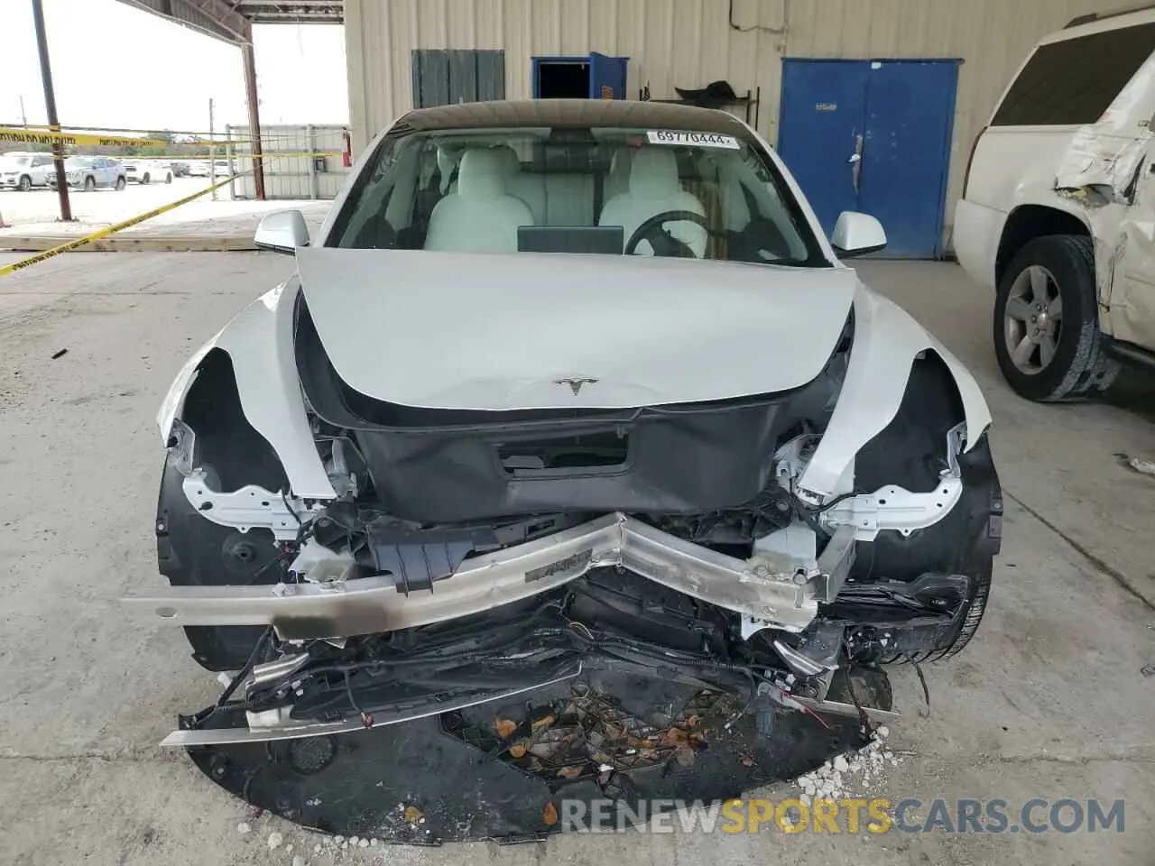 5 Photograph of a damaged car 5YJ3E1EAXNF321803 TESLA MODEL 3 2022