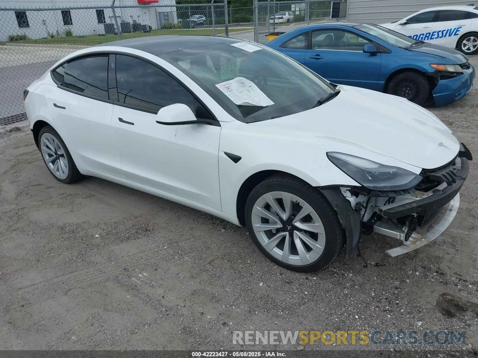 1 Photograph of a damaged car 5YJ3E1EAXNF328184 TESLA MODEL 3 2022