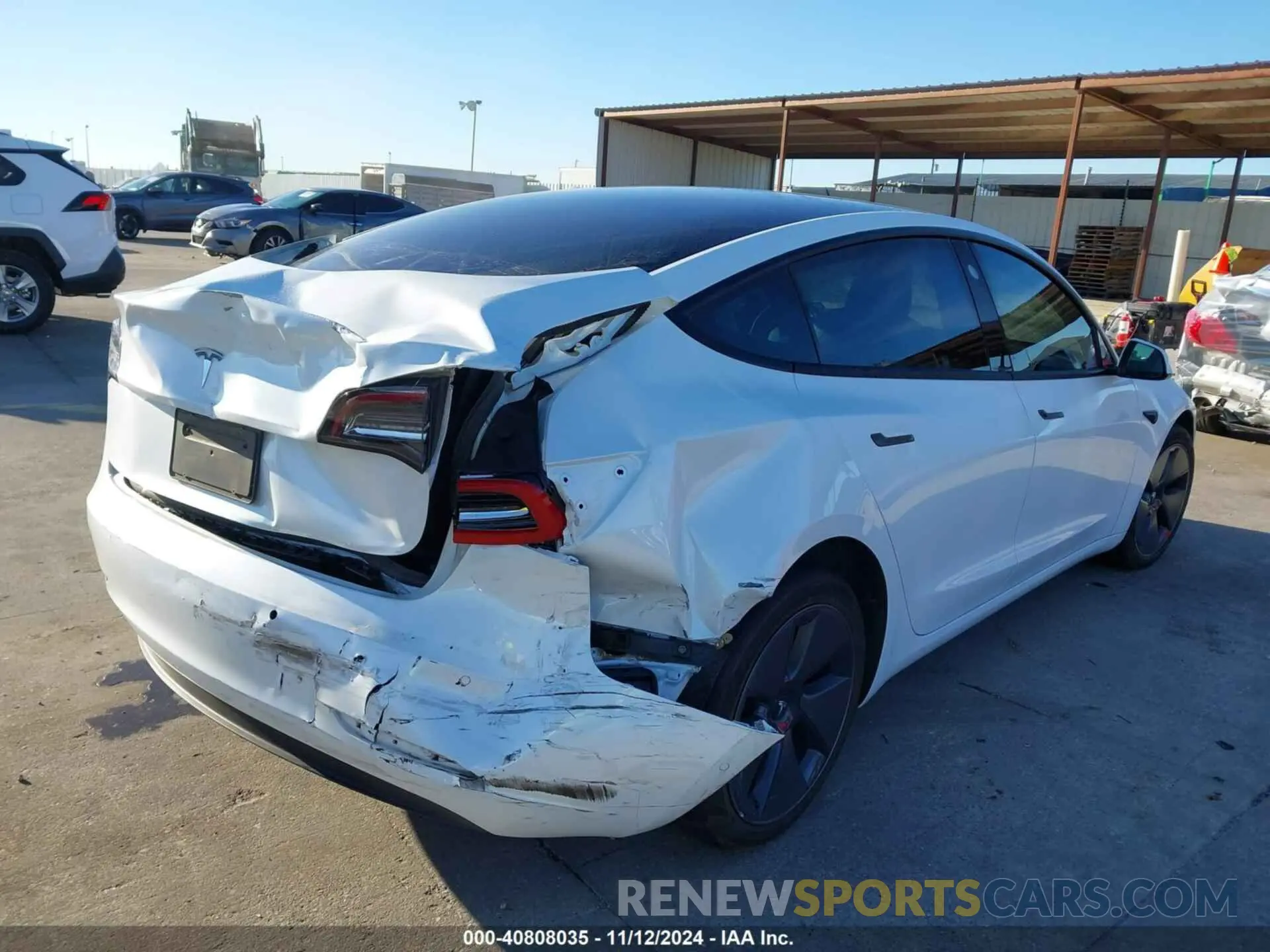 4 Photograph of a damaged car 5YJ3E1EAXNF330727 TESLA MODEL 3 2022