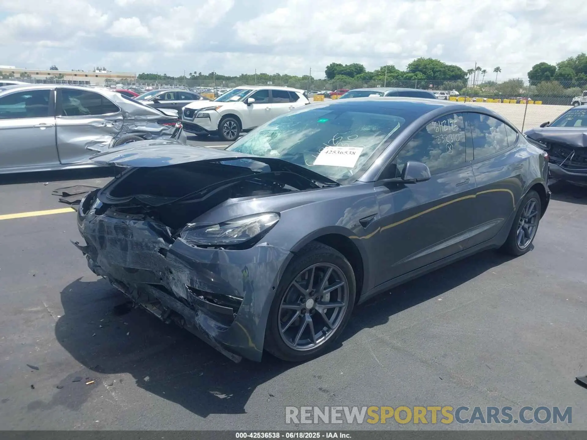 2 Photograph of a damaged car 5YJ3E1EAXNF343350 TESLA MODEL 3 2022