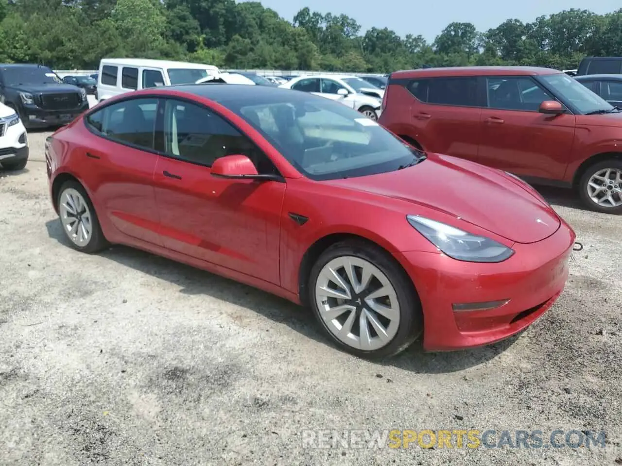 4 Photograph of a damaged car 5YJ3E1EAXNF369821 TESLA MODEL 3 2022