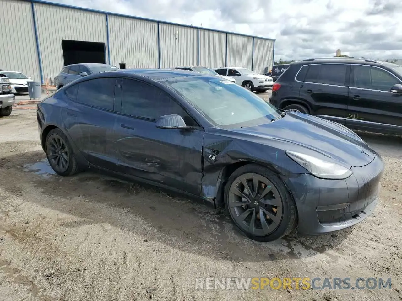 4 Photograph of a damaged car 5YJ3E1EAXNF370032 TESLA MODEL 3 2022