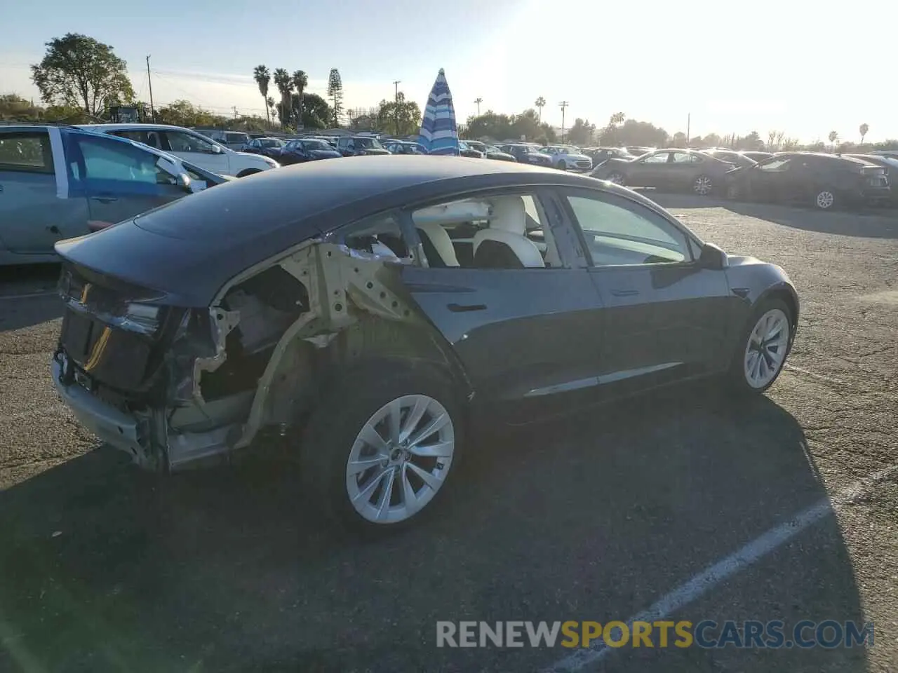 3 Photograph of a damaged car 5YJ3E1EAXNF374601 TESLA MODEL 3 2022