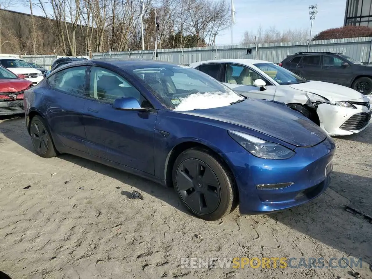 4 Photograph of a damaged car 5YJ3E1EB0NF103121 TESLA MODEL 3 2022