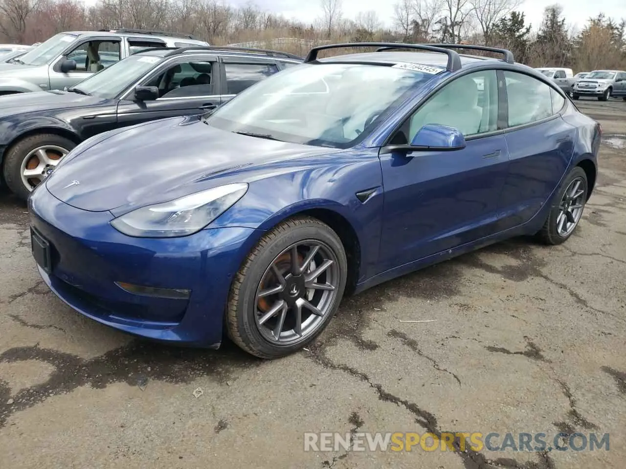 1 Photograph of a damaged car 5YJ3E1EB0NF104060 TESLA MODEL 3 2022