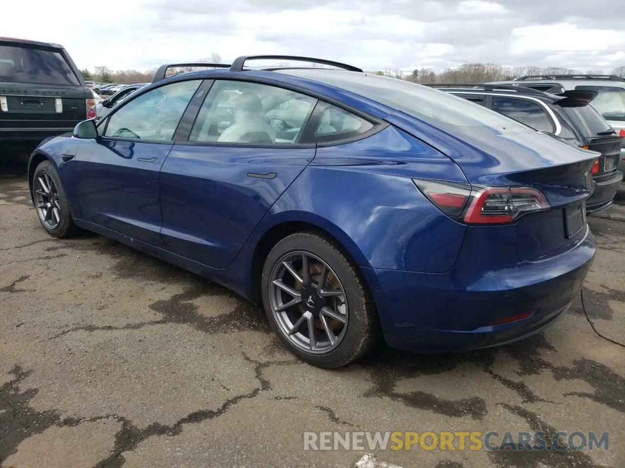 2 Photograph of a damaged car 5YJ3E1EB0NF104060 TESLA MODEL 3 2022
