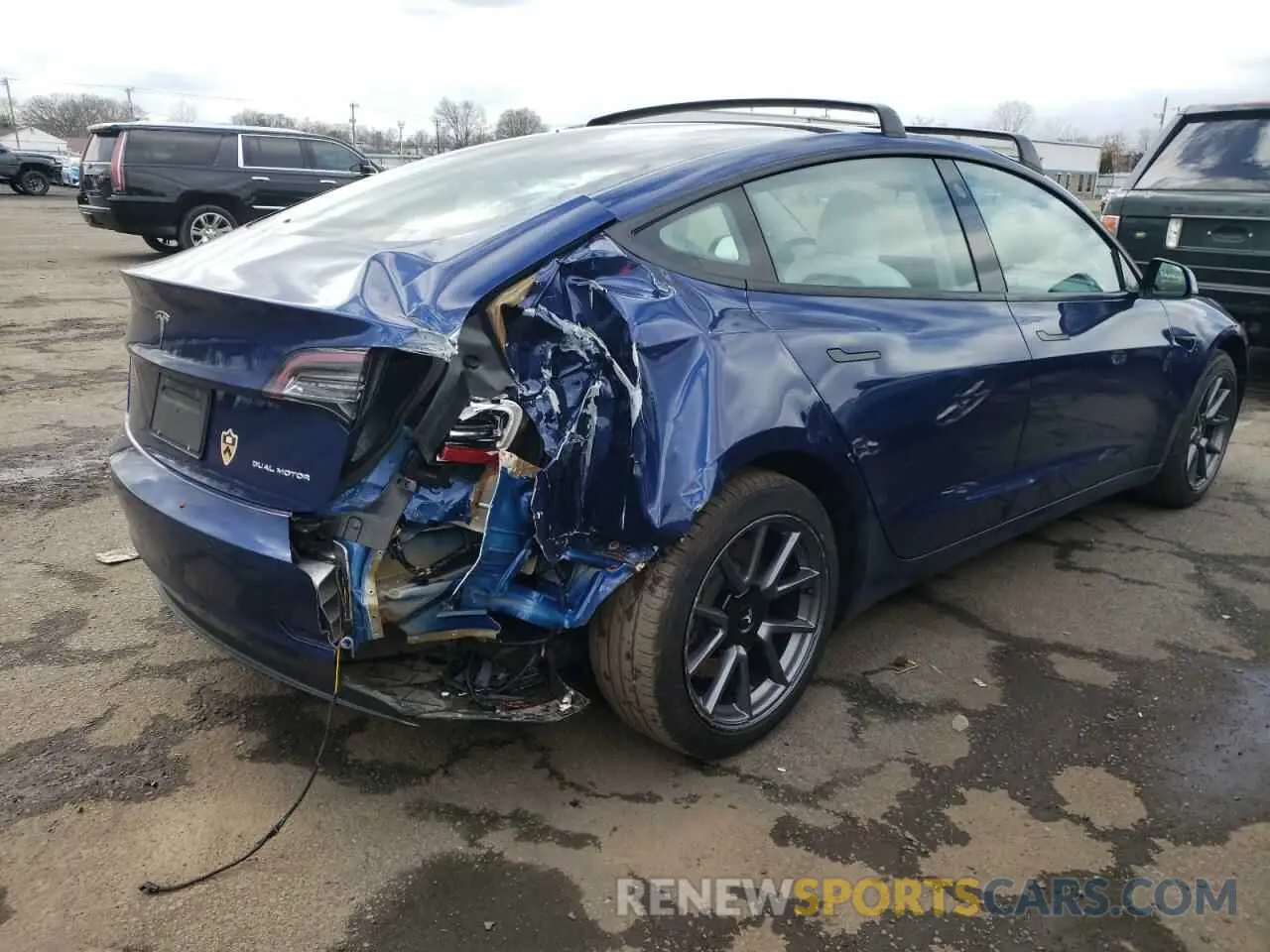3 Photograph of a damaged car 5YJ3E1EB0NF104060 TESLA MODEL 3 2022