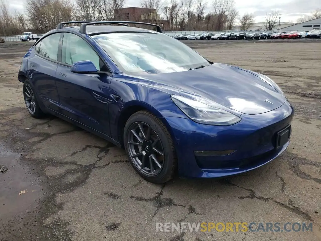 4 Photograph of a damaged car 5YJ3E1EB0NF104060 TESLA MODEL 3 2022