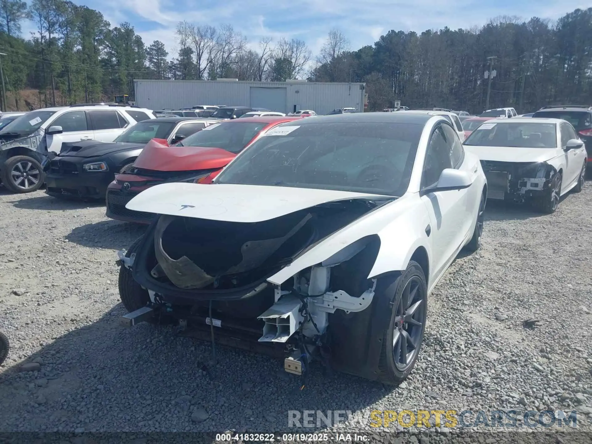 2 Photograph of a damaged car 5YJ3E1EB0NF106570 TESLA MODEL 3 2022