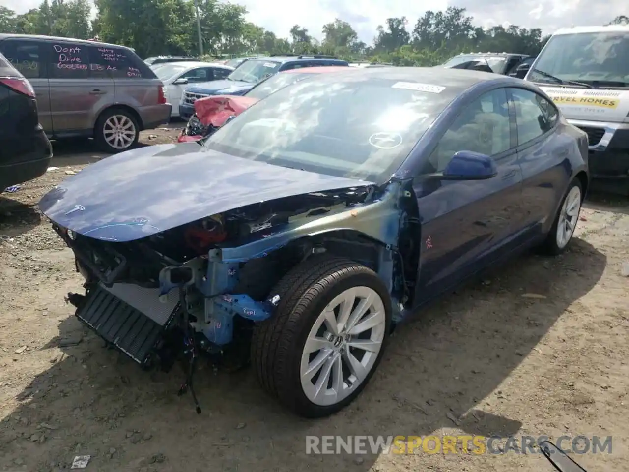 2 Photograph of a damaged car 5YJ3E1EB0NF106844 TESLA MODEL 3 2022