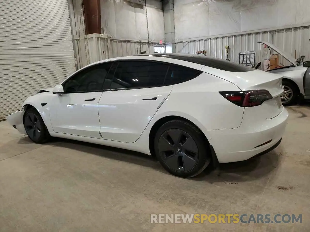 2 Photograph of a damaged car 5YJ3E1EB0NF118654 TESLA MODEL 3 2022