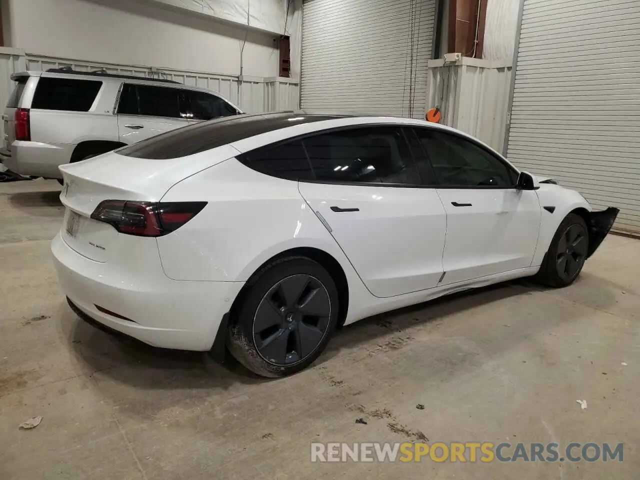 3 Photograph of a damaged car 5YJ3E1EB0NF118654 TESLA MODEL 3 2022