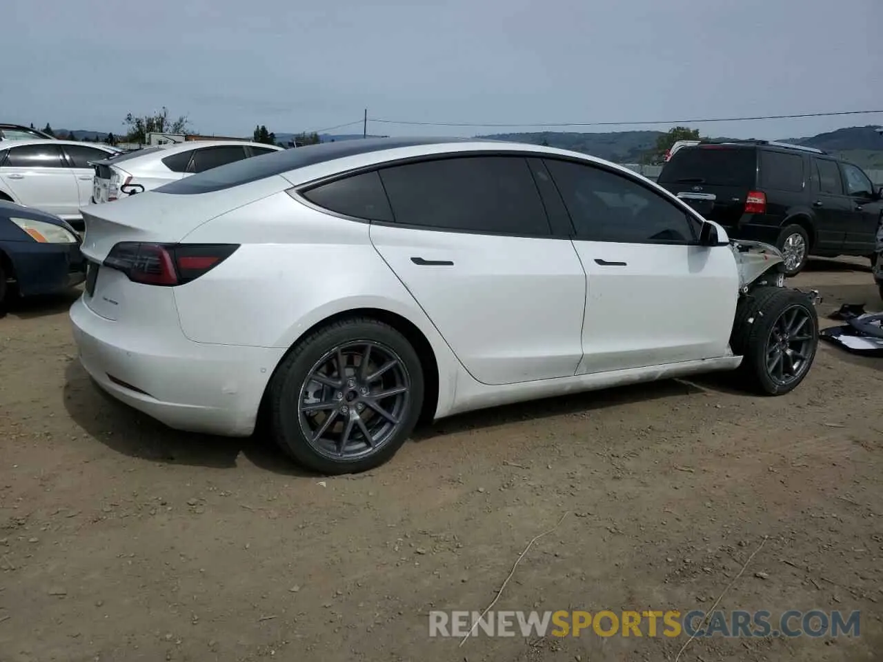 3 Photograph of a damaged car 5YJ3E1EB0NF123224 TESLA MODEL 3 2022