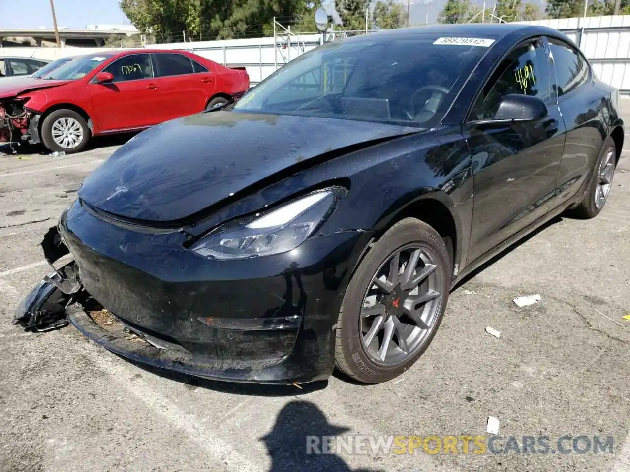 2 Photograph of a damaged car 5YJ3E1EB0NF128665 TESLA MODEL 3 2022