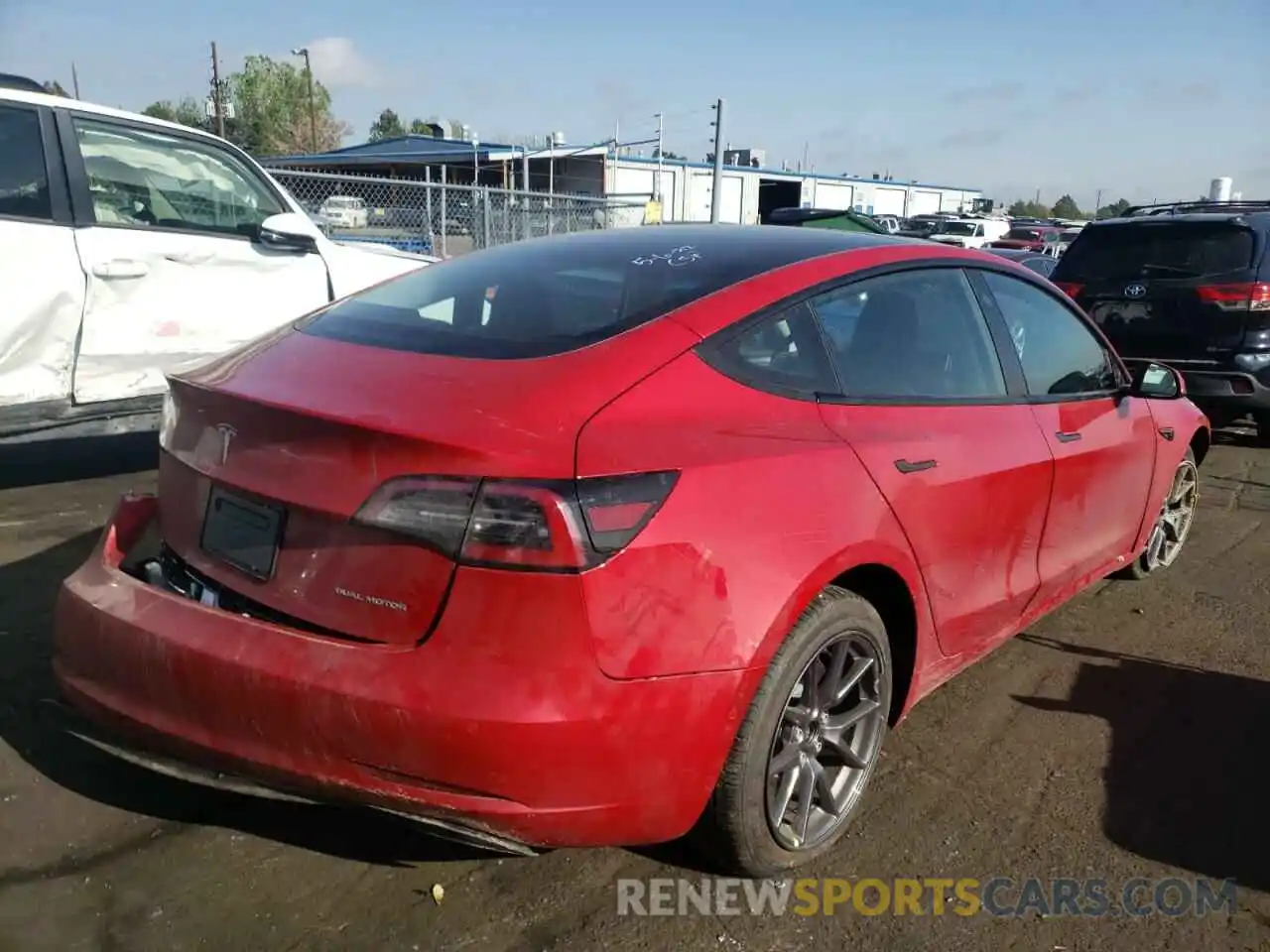 4 Photograph of a damaged car 5YJ3E1EB0NF131498 TESLA MODEL 3 2022