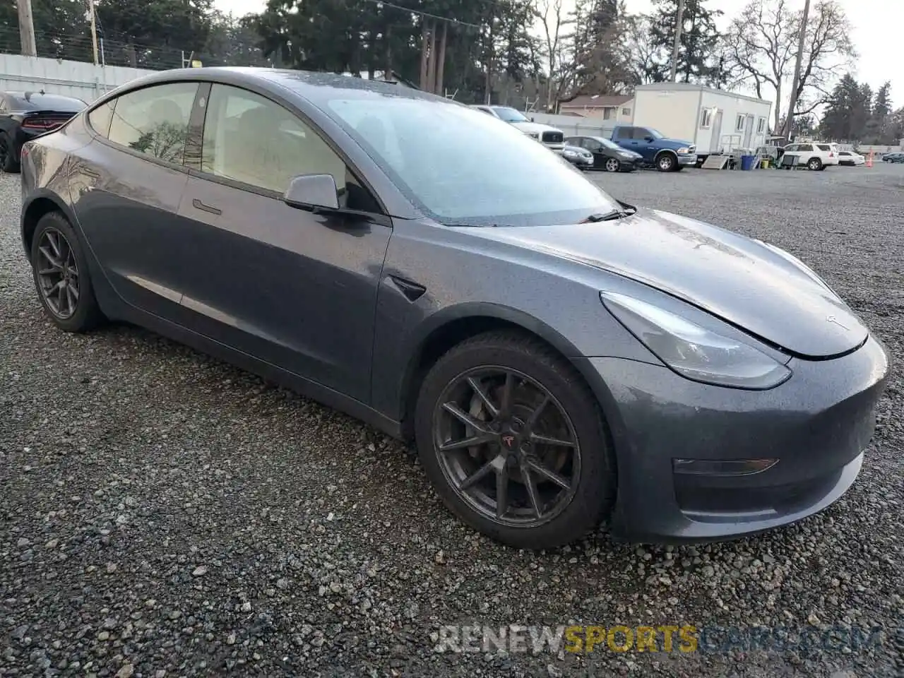 4 Photograph of a damaged car 5YJ3E1EB0NF136300 TESLA MODEL 3 2022