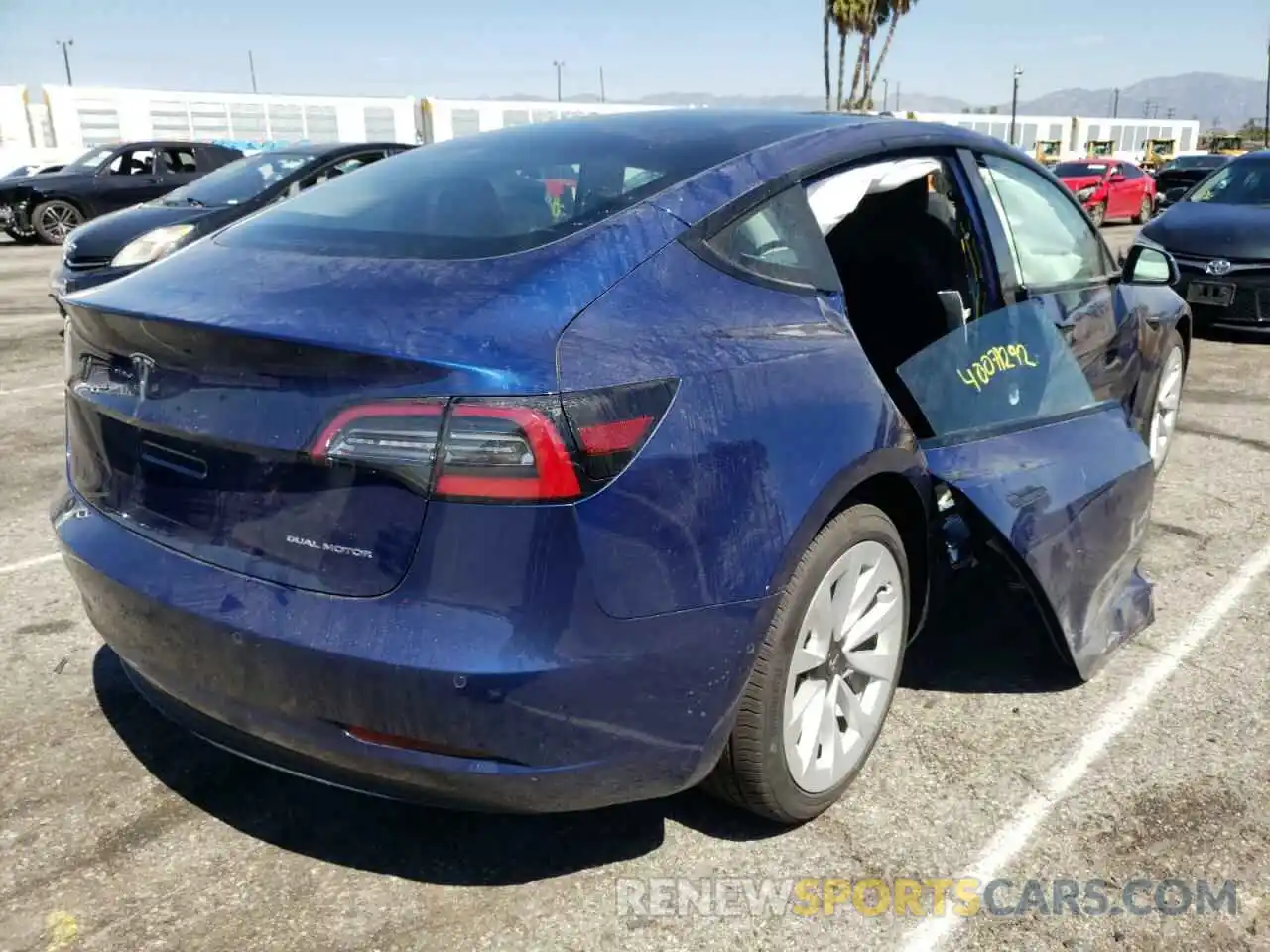 4 Photograph of a damaged car 5YJ3E1EB0NF142825 TESLA MODEL 3 2022