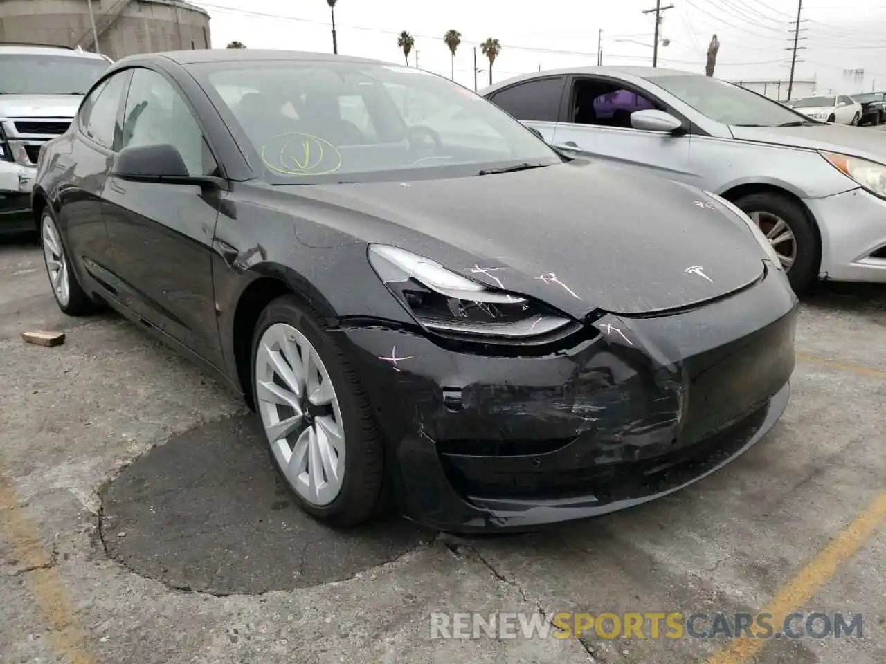 1 Photograph of a damaged car 5YJ3E1EB0NF143554 TESLA MODEL 3 2022