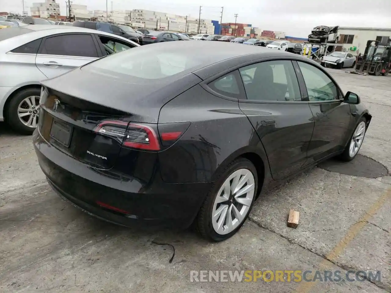 4 Photograph of a damaged car 5YJ3E1EB0NF143554 TESLA MODEL 3 2022