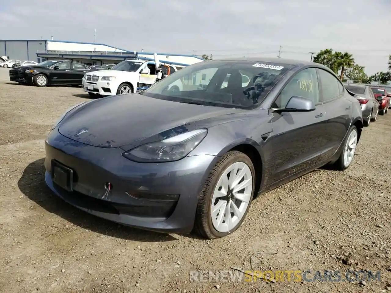 2 Photograph of a damaged car 5YJ3E1EB0NF145739 TESLA MODEL 3 2022