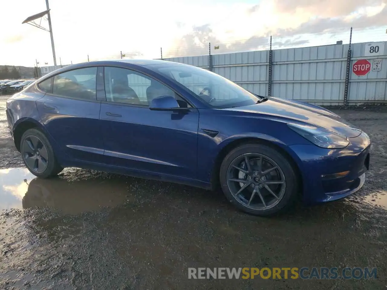 4 Photograph of a damaged car 5YJ3E1EB0NF147376 TESLA MODEL 3 2022