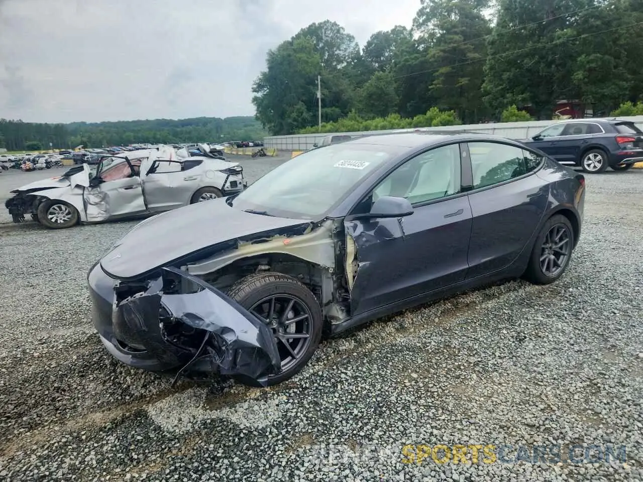 1 Photograph of a damaged car 5YJ3E1EB0NF163495 TESLA MODEL 3 2022