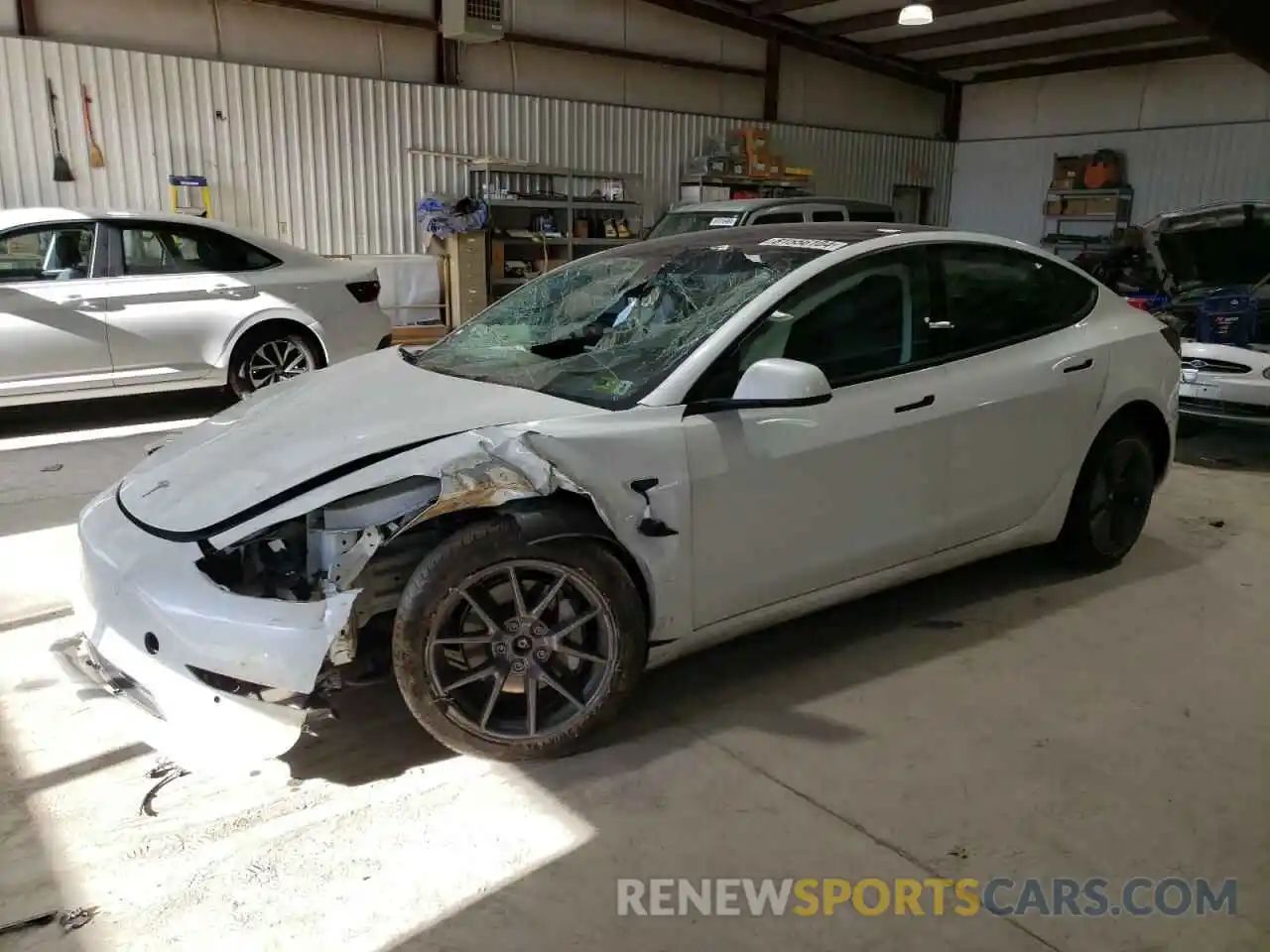 1 Photograph of a damaged car 5YJ3E1EB0NF183875 TESLA MODEL 3 2022