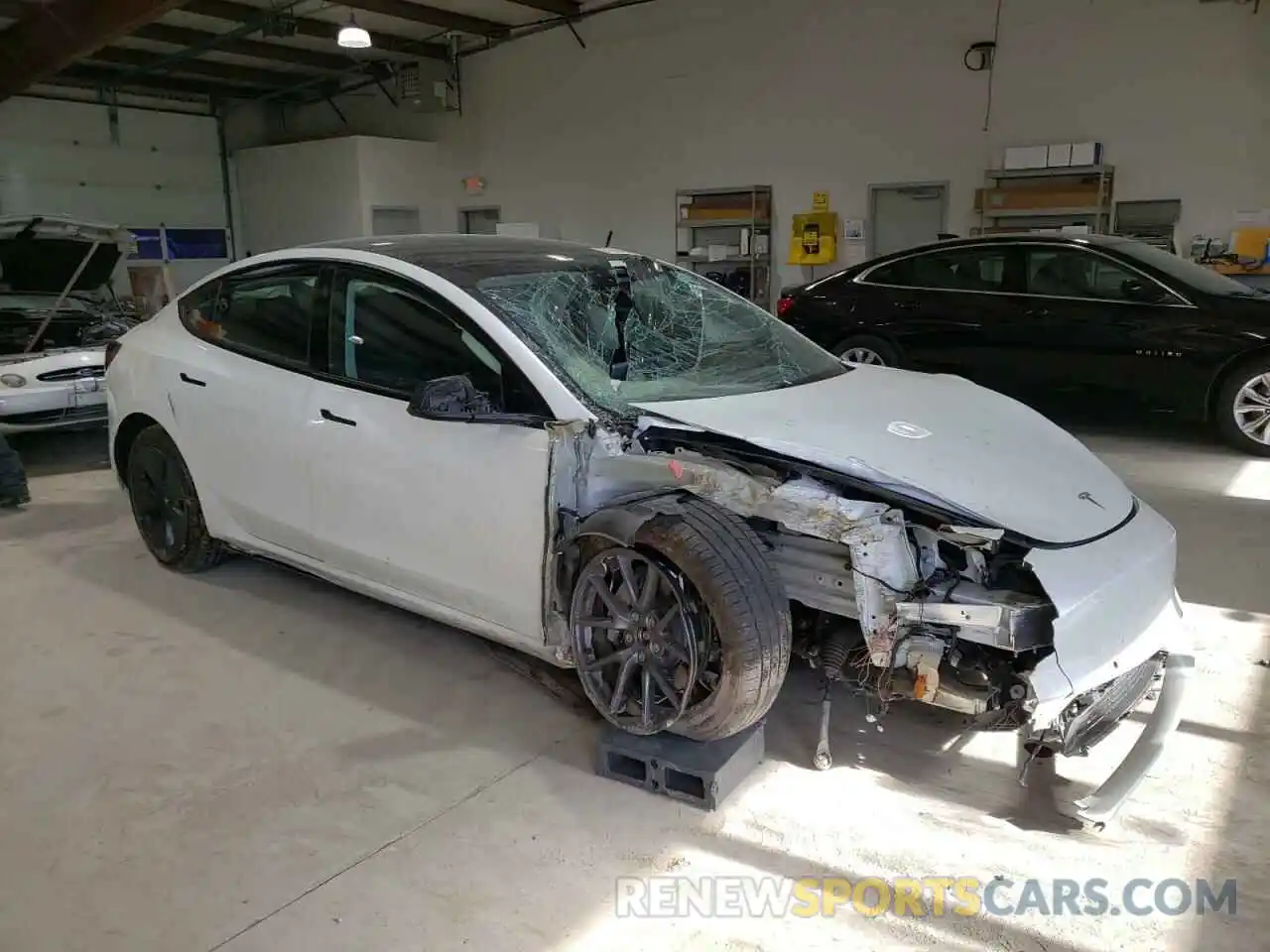 4 Photograph of a damaged car 5YJ3E1EB0NF183875 TESLA MODEL 3 2022