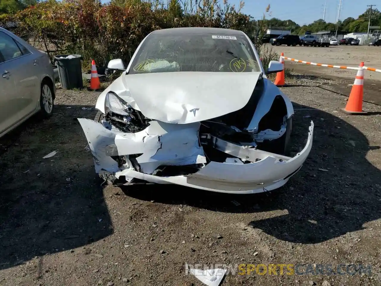 9 Photograph of a damaged car 5YJ3E1EB0NF187988 TESLA MODEL 3 2022