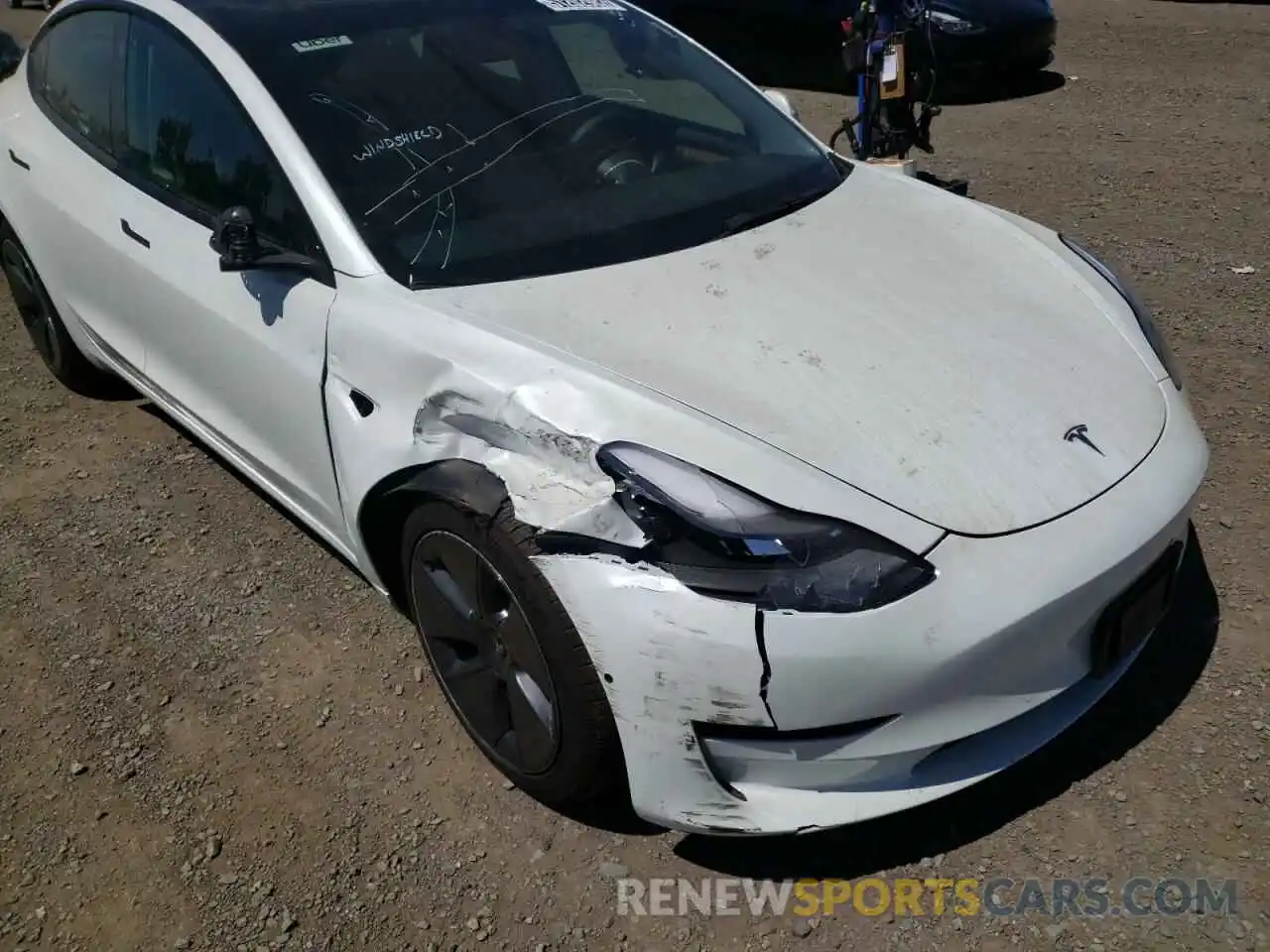 9 Photograph of a damaged car 5YJ3E1EB0NF190972 TESLA MODEL 3 2022