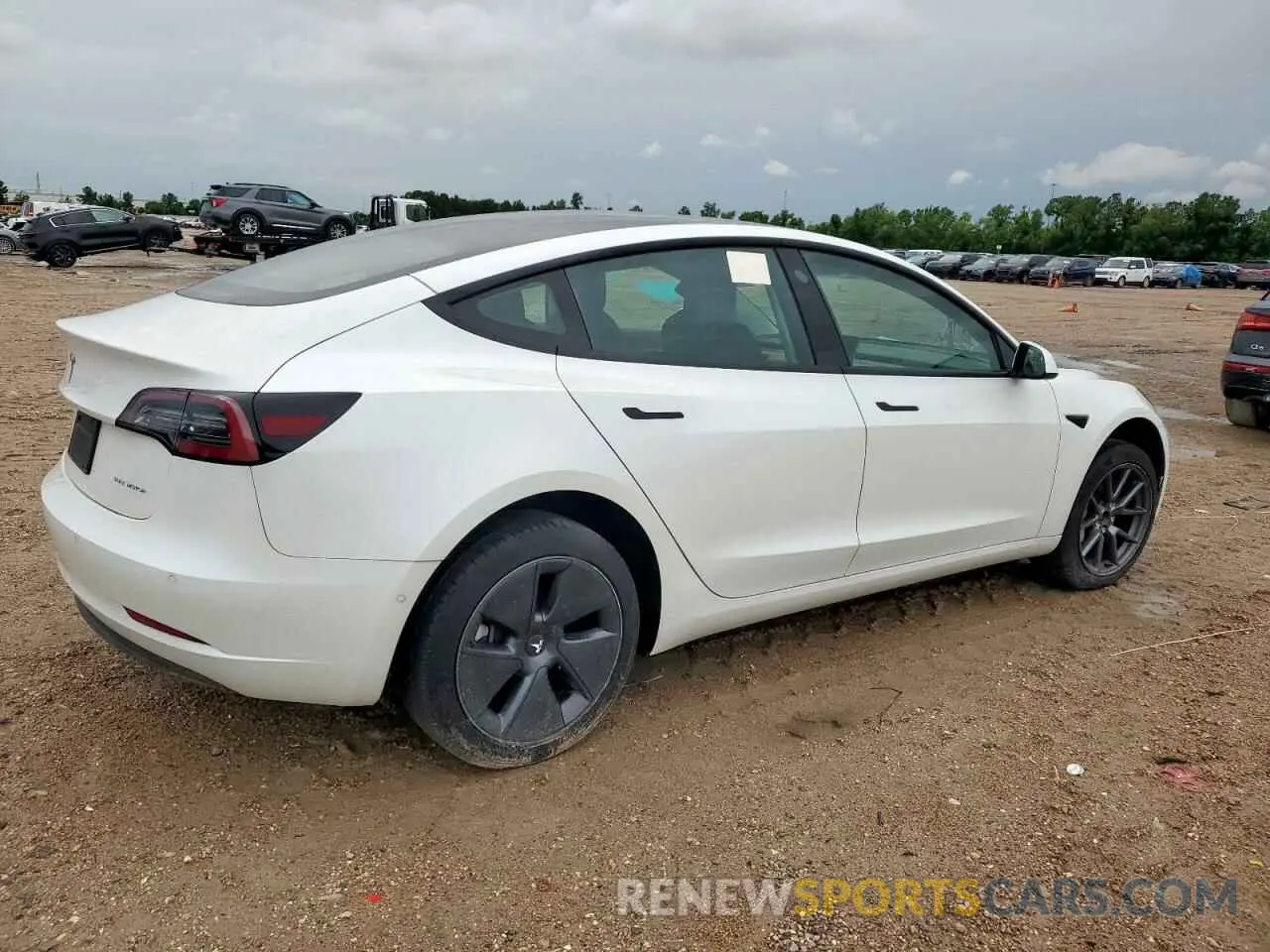 3 Photograph of a damaged car 5YJ3E1EB0NF198621 TESLA MODEL 3 2022